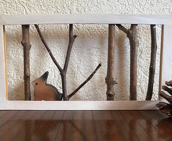 Paysage en branches dans un cadre